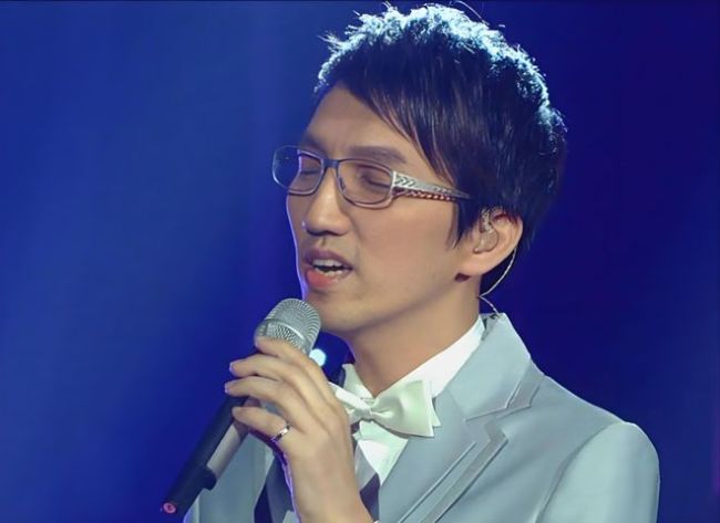 何炅说到林志炫淘汰时抽泣红了眼眶 争议与真相背后的音乐战争